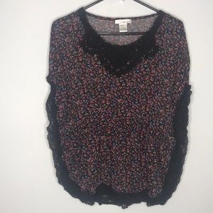 Sheer floral statement shirt. Very boho-chic.